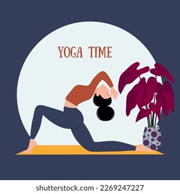 The girl does yoga. A woman is doing physical exercises. A girl in a T-shirt and leggings.
