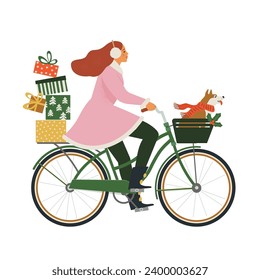 A girl with a dog in a basket and gifts rides a bicycle to celebrate Christmas