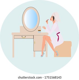 Girl doing make up after taking a shower