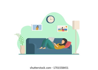 a girl doing the work on the sofa