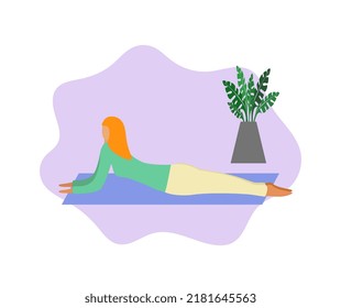 The girl is doing yoga, half-cobra pose - Ardha Bhujangasana. Sport, workout, meditation and healthy lifestyle.