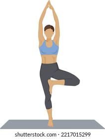 Girl doing yoga in tree pose
