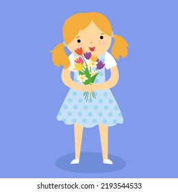 Girl in a dress holding flowers