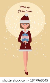 A girl dressed as Santa holds gifts for the Christmas holiday