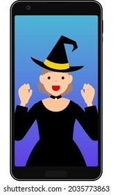 Girl dressed up as a witch having an online Halloween party on her phone.