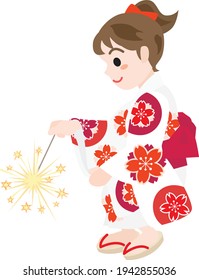 A Girl dressed in yukata doing toy fireworks. This is summer play of Japan.