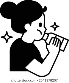 Una chica está bebiendo de una botella