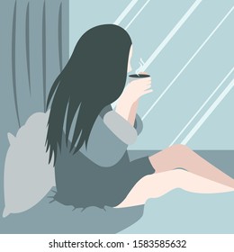 
Girl drinking a coffee in bed in the morning