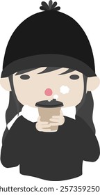 A girl is drinking hot drink in winter.