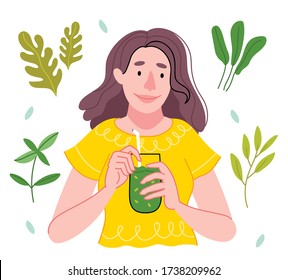 Girl drinks  detox green smoothie. Fitness lifestyle and nutrition concept. Healthy detox vegan diet with vegetable cold pressed extractor to extract nutrients for smoothie drink.  