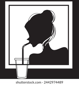 A girl drinks a drink through a straw from a glass