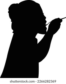a girl eating food, head silhouette vector