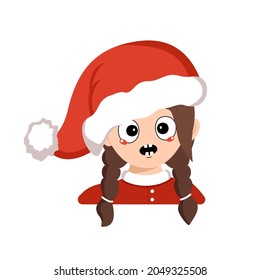 Girl with emotions panic, surprised face, shocked eyes in red Santa hat. Cute kid with scared expression in carnival costume for New Year, Christmas and holiday. Head of adorable child