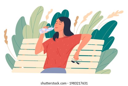 Girl enjoying drinking water while sitting on a park bench