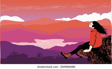 girl enjoys a beautiful view of lake and mountains at sunset in fall  winter sitting on a big rock wearing orange down jacket, black tights and suede boots, flying hair, relax, cool, free, and happy  
