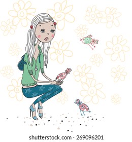 girl feeding birds