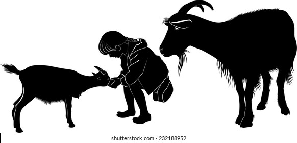 girl feeding a goat