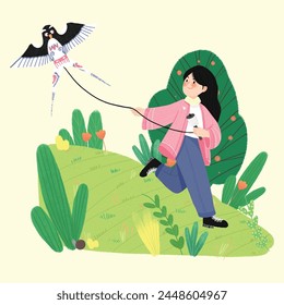 Girl flying kite on the grass