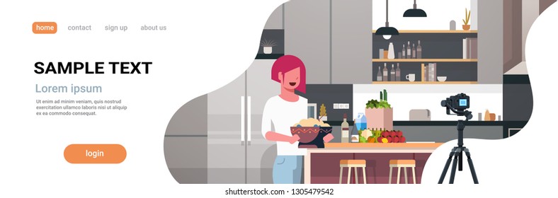 girl food blogger recording video on camera woman preparing tasty dish modern kitchen interior cooking blog concept female character portrait flat copy space horizontal