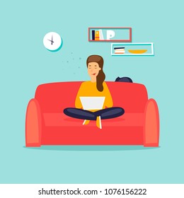 Girl freelancer working on the couch. Flat design vector illustration.