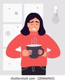 The girl is freezing at the window in her house, a hot drink is warming up. It's cold in the apartment in winter. Vector graphics.