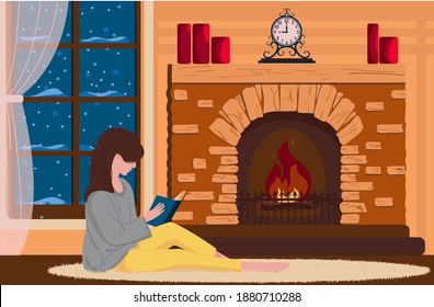  A girl in front of a fireplace in a cozy home environment reads a book. It's snowing outside