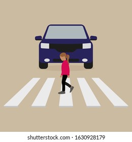 A girl goes on a pedestrian crossing in front of a car