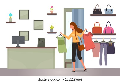 The girl with a hangers with t-shirts in her hands shopping. Buyer is selecting clothes in a store. Young beautiful fashion girl isolated on white background. Woman goes to the checkout with purchases