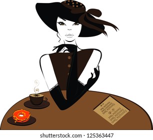 Girl in hat in the cafe