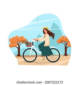 Girl in a hat and dress rides a bicycle, autumn landscape. Woman on a bicycle carries apples in a basket. Vector illustration in cartoon style. Flat design.