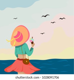 Girl in a hat on the ocean with ice cream.