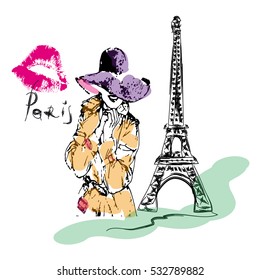 Girl in a hat and trenchcoat, retro style on a background of the Eiffel Tower