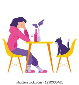 a girl have a dinner with her cat in a dining room