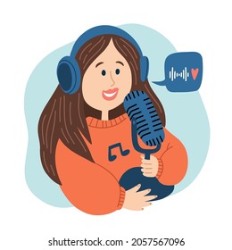A girl in headphones talks into the microphone host of the podcast