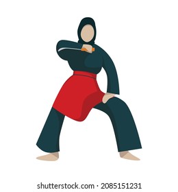 A girl with hijab holding a traditional sickle and demonstrate a move from silat, a martial arts from Indonesia.