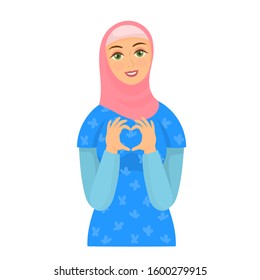 Girl in hijab showing heart symbol with her fingers