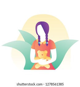 Girl holding bear with leaves