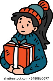 A girl is holding a box and smiling. Concept of joy and excitement, as the girl is likely about to open her gift