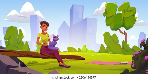 Girl holding cat on green lawn with city on background. Summer landscape with woman with kitten sitting on log, books on mat and town buildings on skyline, vector cartoon illustration