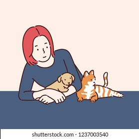 A girl is holding her cute dog   cat in her arms  hand drawn style vector design illustrations 
