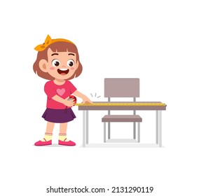 girl holding measure tape and check length of table