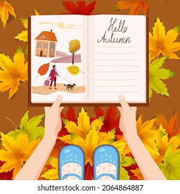 Girl holding an open autumn diary with illustrations daily notepad, acorn, autumn leaves. Background heap of colorful autumn leaves . Vector illustration modern cartoon style