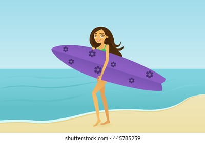 Girl holding a surfboard on the beach