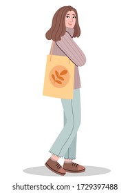 A girl holds an eco bag. Stylish clothes in natural colors in the Korean style.Design for banner, posters, cards etc. Vector illustration.Scandinavian style .Minimalisn . Nature .