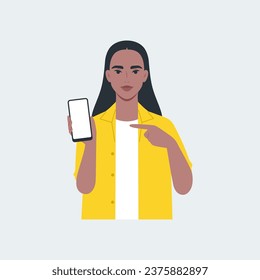 The girl holds a phone in her hand and shows with a gesture