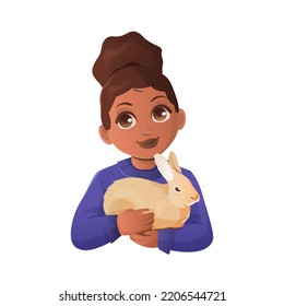 Girl holds a rabbit in her hands and hugs him