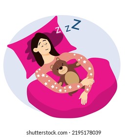 Girl hugging teddy bear lying on bed, child having a peaceful sleep.