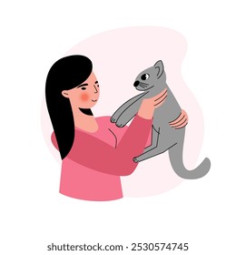 Niña abraza una ilustración de gato. La mujer ama el carácter de la ilustración del gato.