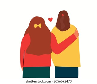 A girl hugs a friend, two girls stand with their backs. Close friends, two girls meet, are friends. Gay marriage 