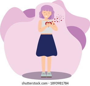 Girl hugs a valentine card from a loved one